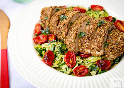 Zucchini Noodles with Kale Pesto, Roasted Tomatoes and Pecan-Crusted Paleo Chicken